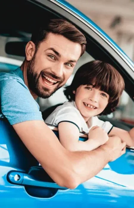 depositphotos_212726680-stock-photo-man-kid-sitting-wheel-new